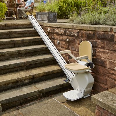 Outdoor stairlift for a hillside home